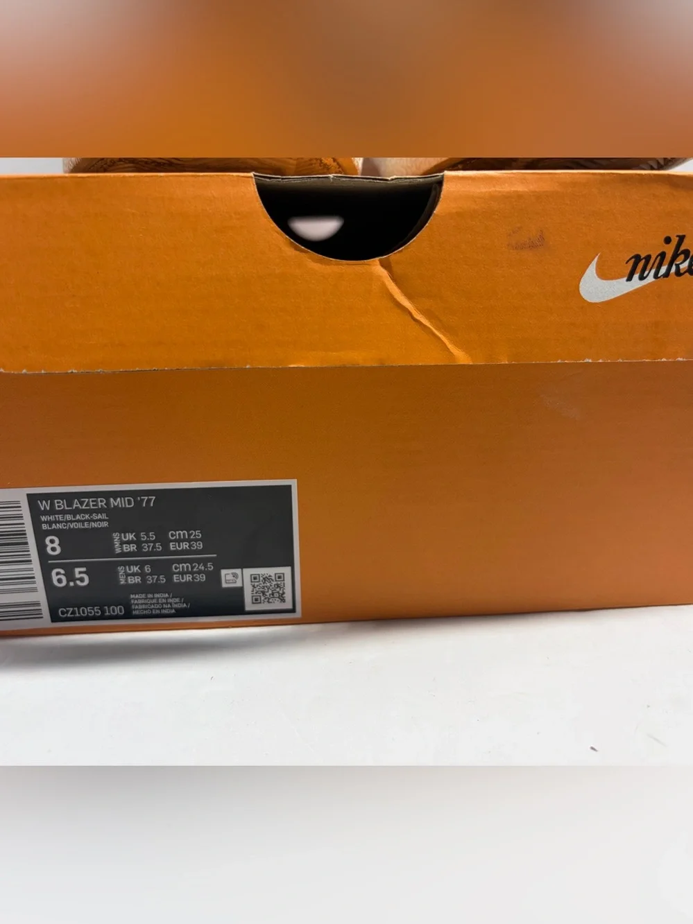 Nike unisex White High-Top Sneakers with Black Swoosh and Yellow Tongue Tab